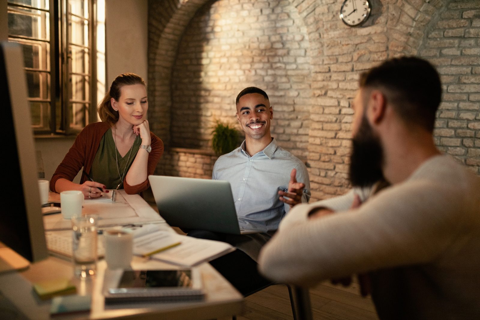 professionals collaborating in a casual office setting
